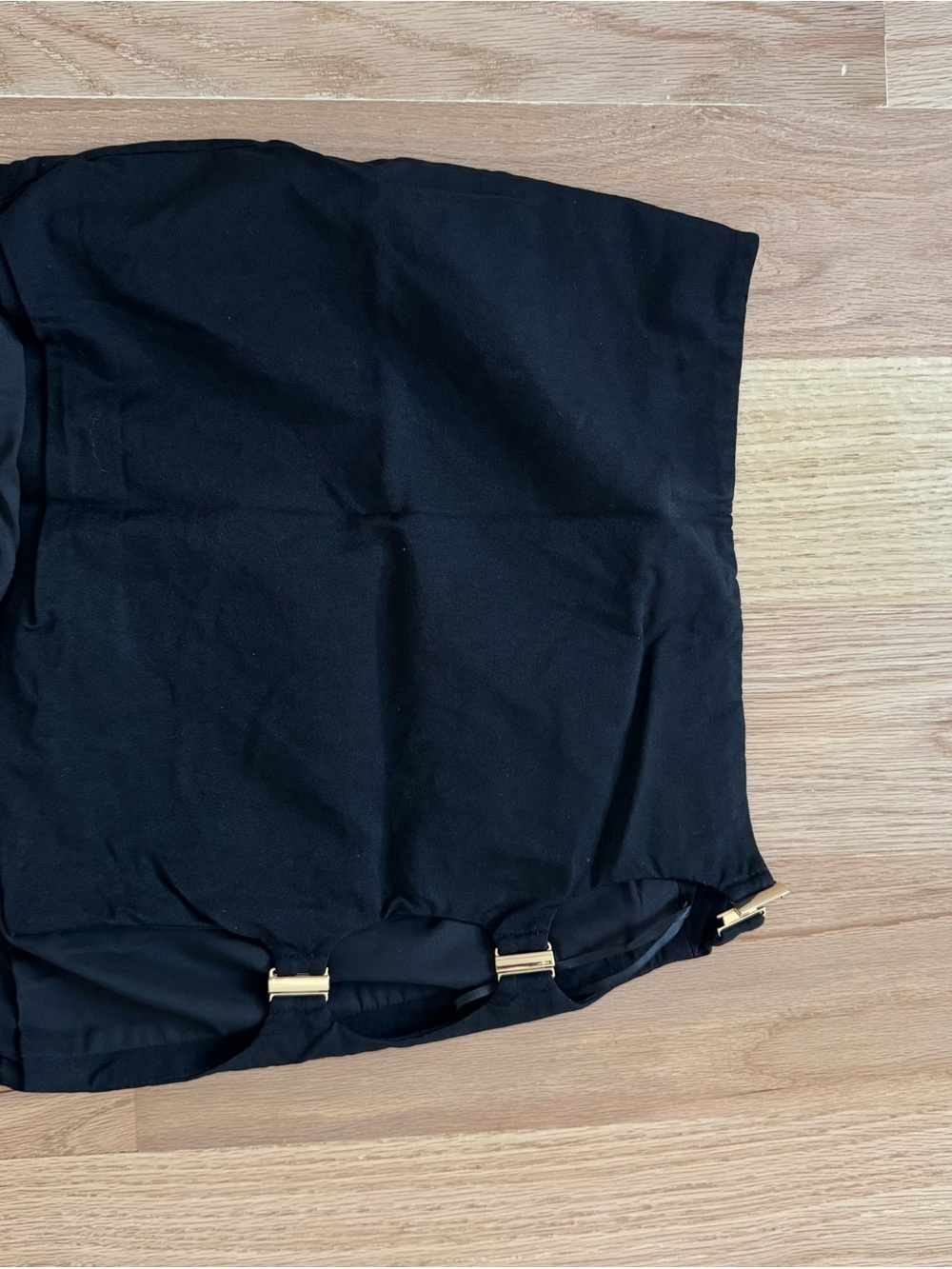NBD Black Miniskirt with cutouts and gold clasps, Sz Med